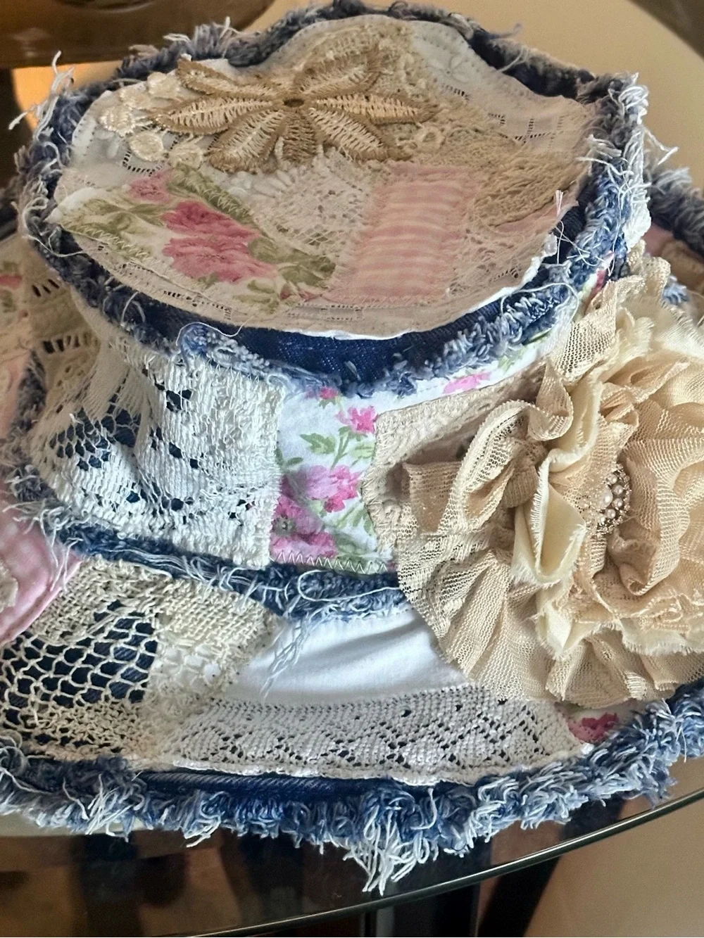 Artisan-made Bohemian Cream Floral Fabric Hat with Frayed Denim Trim